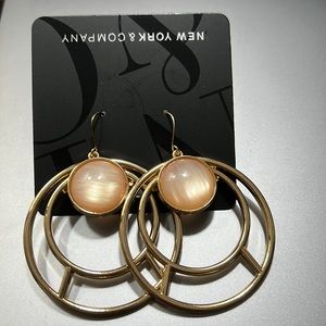 Classy circular pinky peach gold tone earrings